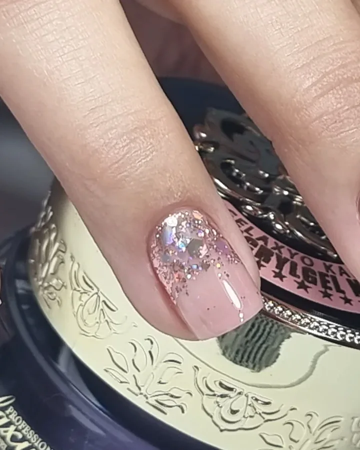 Nude manicure with glitter detail by SG Beauty